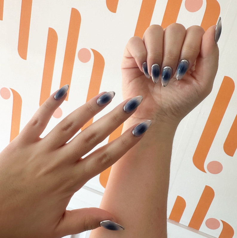 Editorial nail art — blue ombre almonds
